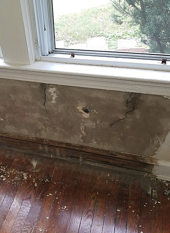 water-damaged-wall-repair-seal-bedroom-85